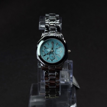 Turkuaz Kadranlı Gümüş Renk Metal Kordon Kadın Kol Saati